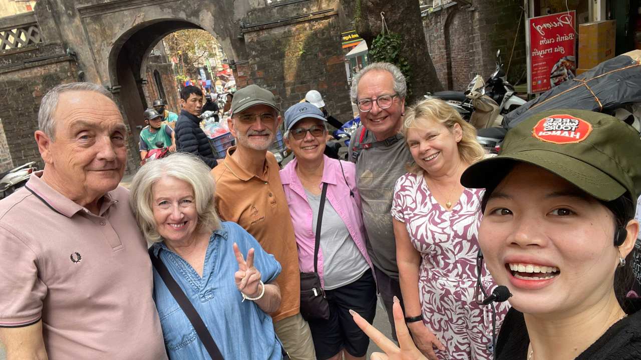 Hanoi Old Quarter Walking Tour with Guests at O Quan Chuong Gate