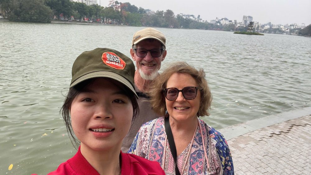 Hanoi French Quarter Walking Tour with Travelers Visiting Hoan Kiem Lake and the Opera House