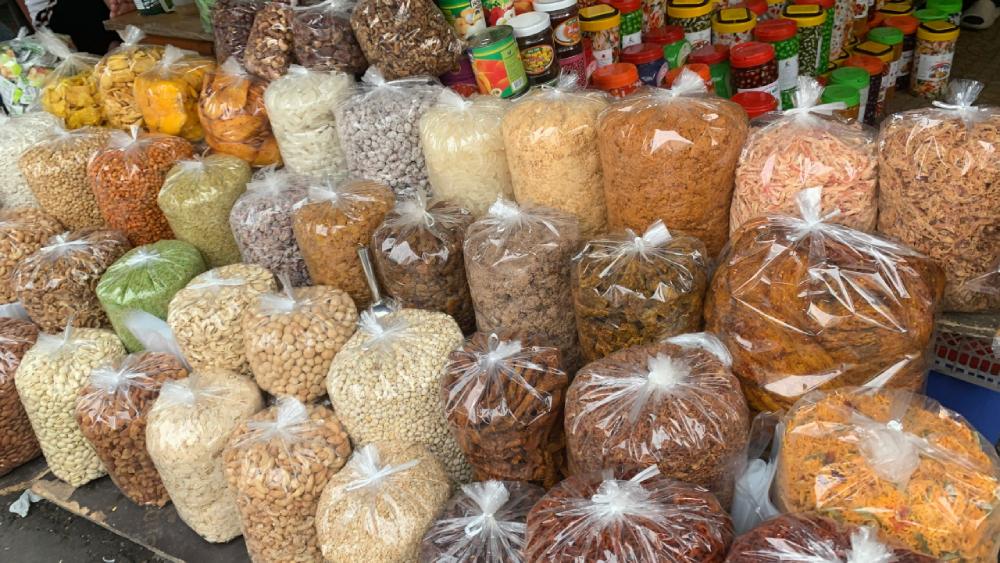 Colorful spices and dried foods at Dong Xuan Market Hanoi