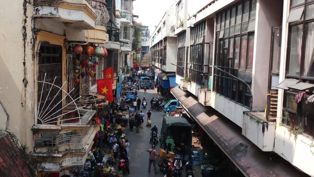 Traditional buildings and coffee shops in Hanoi Old Quarter seen during a free walking tour Hanoi