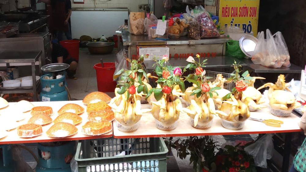 Local street food stall in Hanoi Old Quarter visited during a Hanoi walking tour