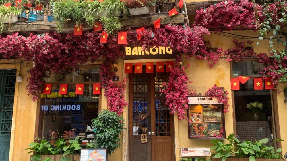 Beautiful flower balcony cafe in Hanoi Old Quarter