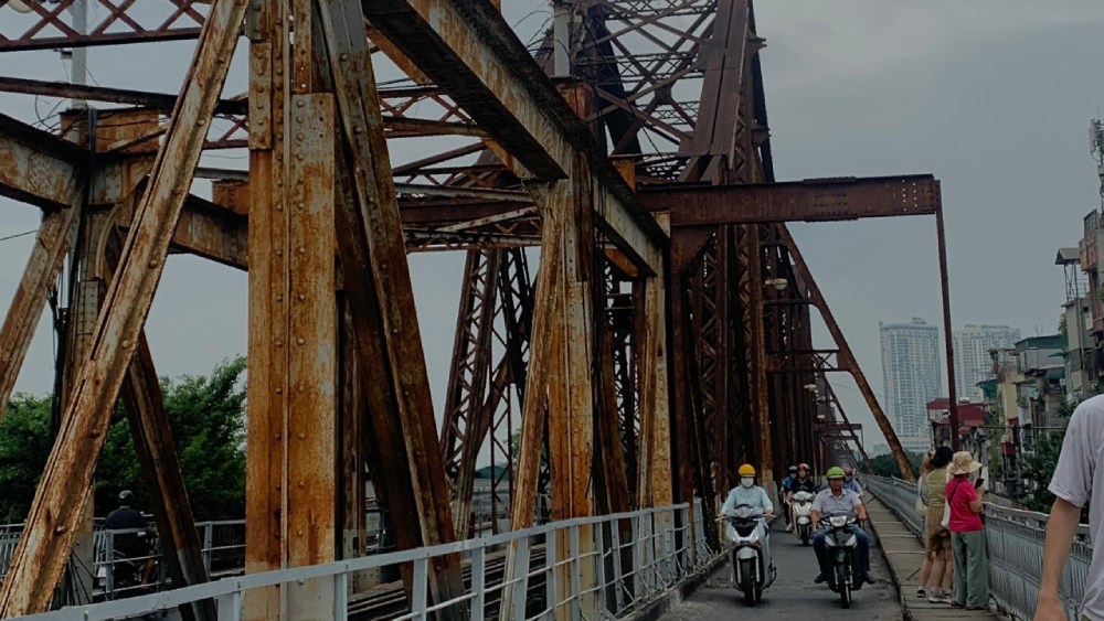 Long Bien Bridge Hanoi during a free walking tour with international visitors