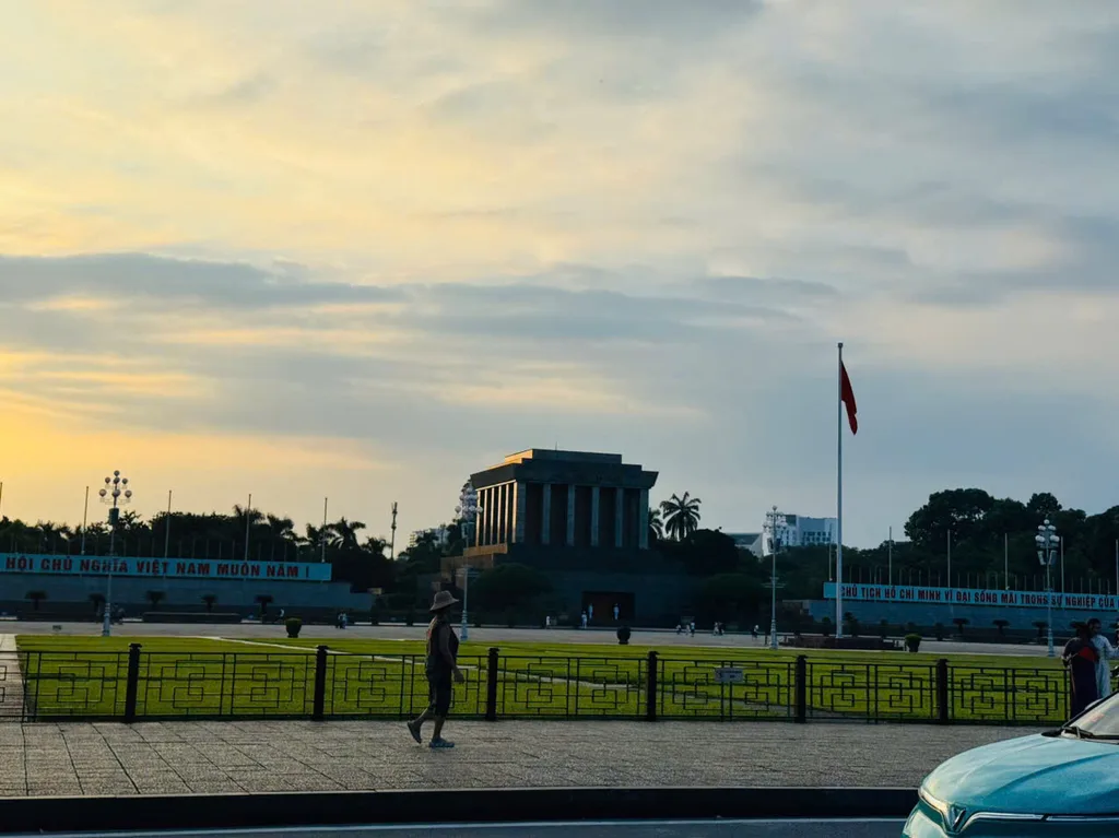 Ho Chi Minh Mausoleum and Ba Dinh Square under evening light.