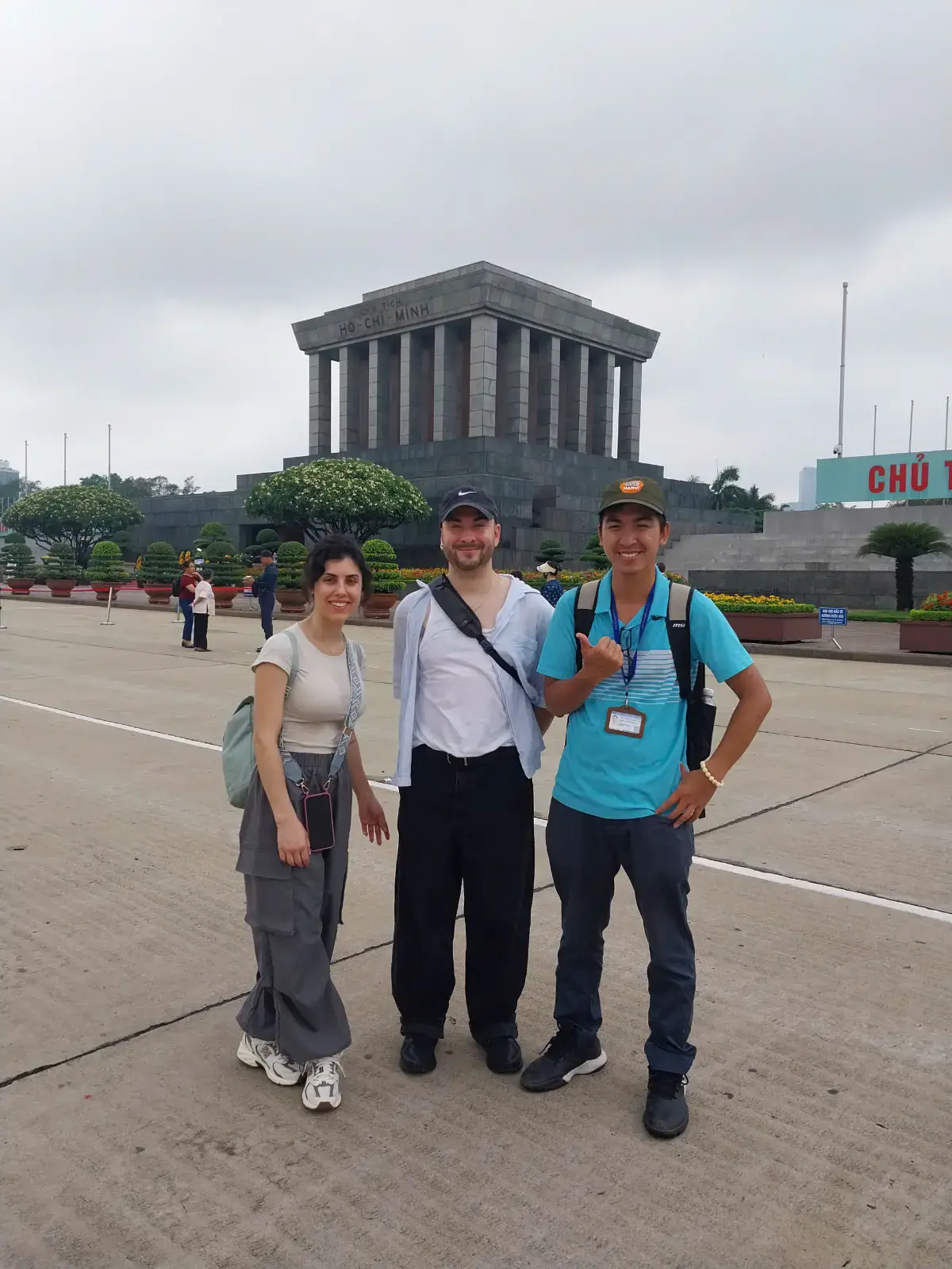 Spanish travellers with local guide Luis visiting Ho Chi Minh Mausoleum and Ba Dinh Square in Hanoi.
