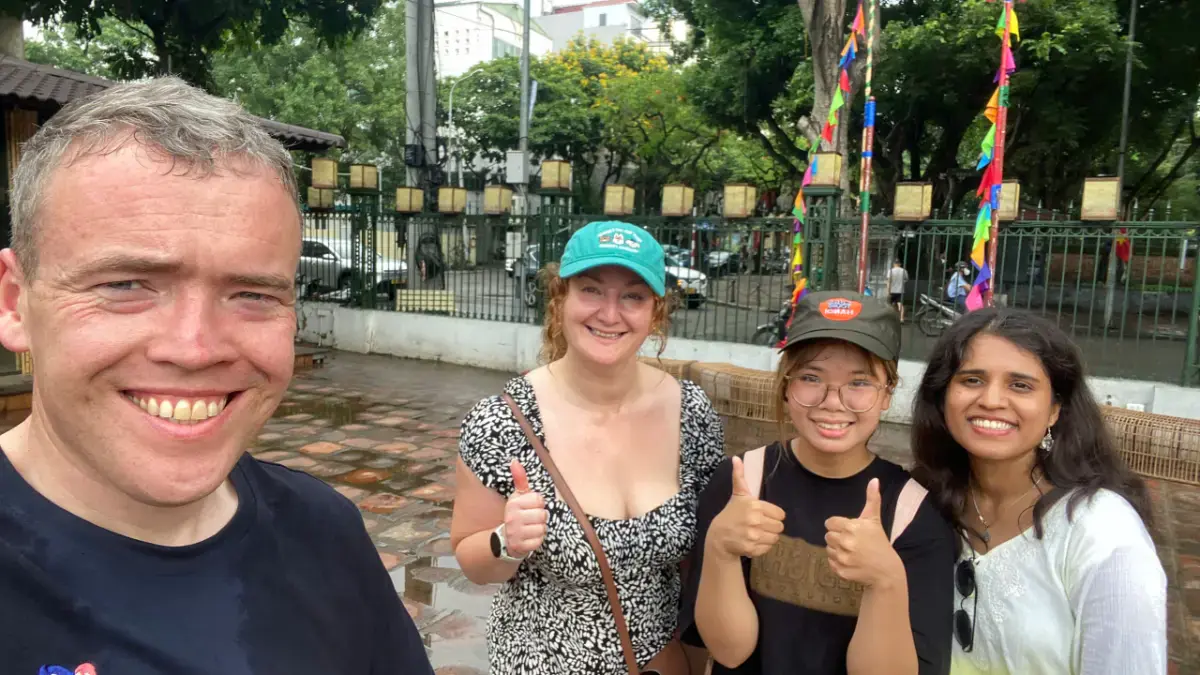 Guide William with guests Christine Brennan and Sukruta Chimalker at Tran Quoc Pagoda, Ho Chi Minh Mausoleum and the Temple of Literature.